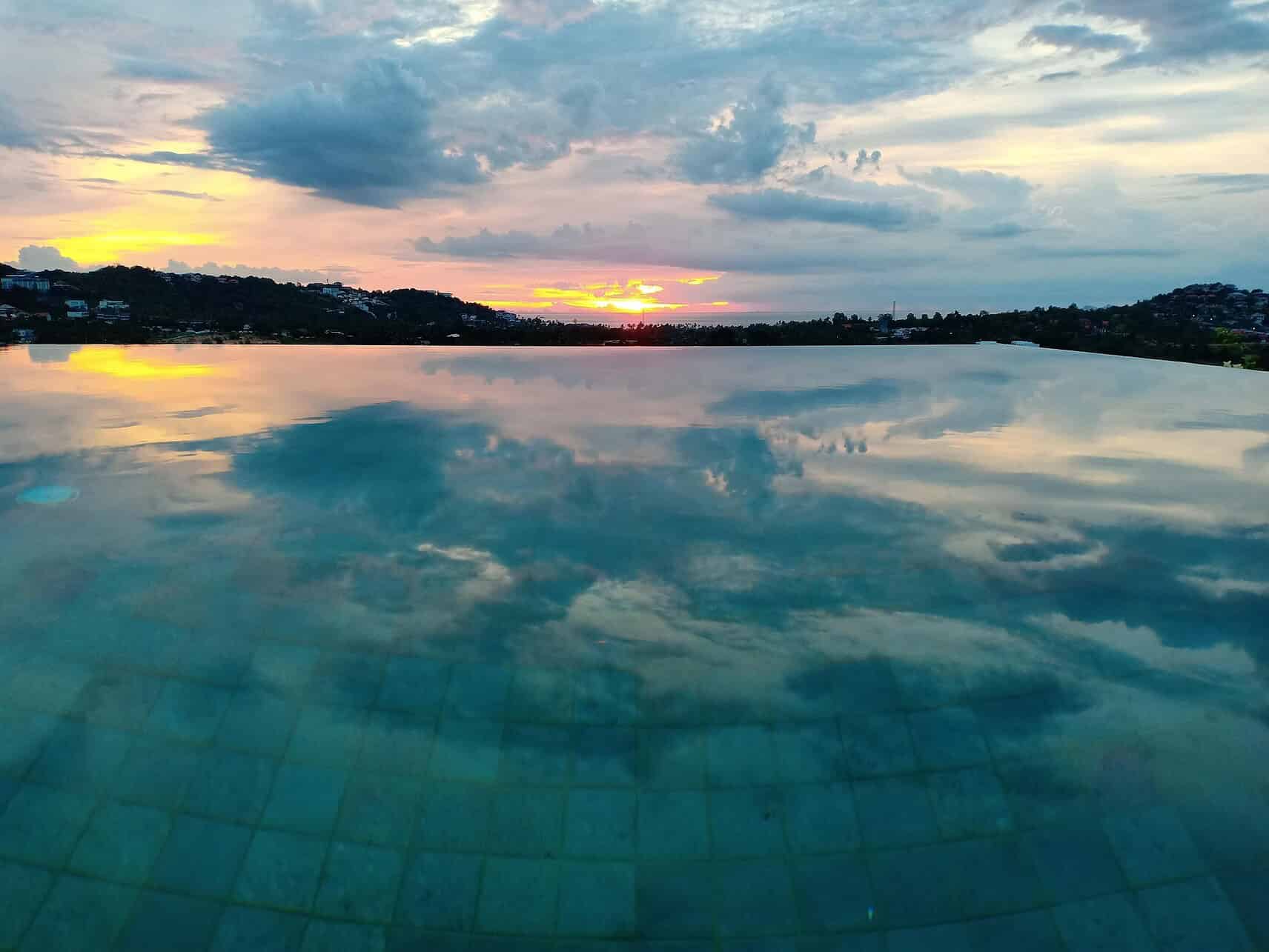 wed in thailand - Top Reasons to Wed in Thailand’s Paradise Infinity pool at sunset in Thailand.